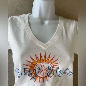 White v-neck “salty sista” graphic t-shirt